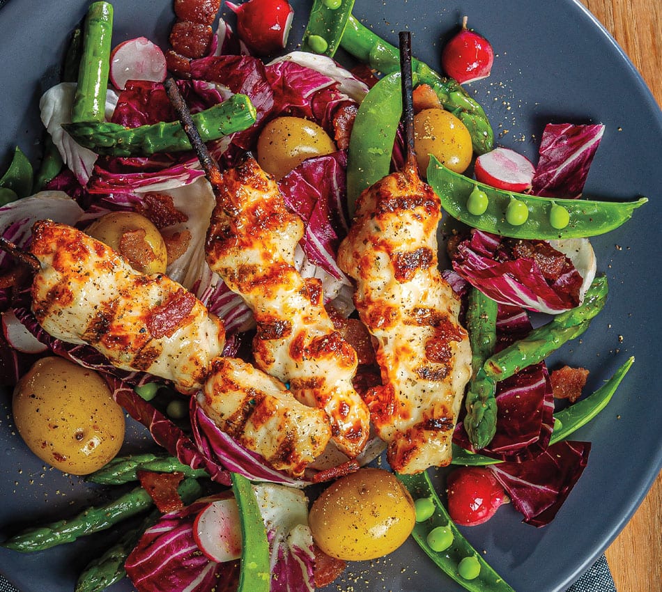 Bacon-Basted Chicken Breast Skewers over Spring Salad